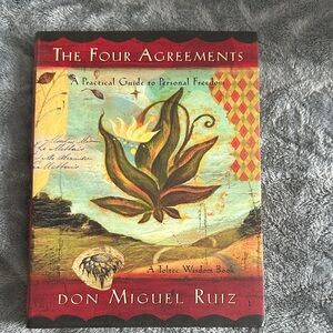 The Four Agreements by - Red and Green Cover